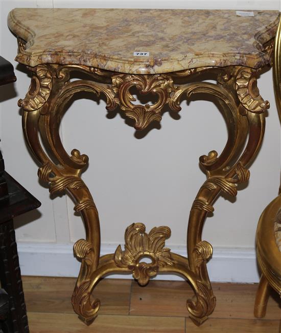 A serpentine gilt wall console table W.65cm